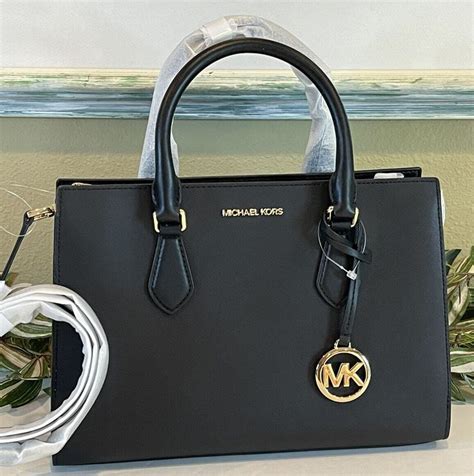 michael kors umhängetasche schwarz gold|michael kors sheila medium.